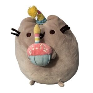 Pusheen snackables happy birthday plush holding a cupcake with a candle